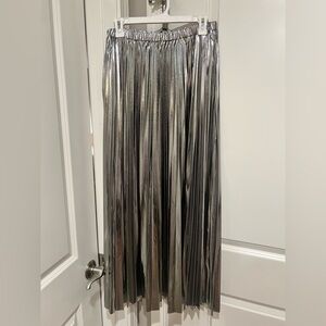 Dressed in LALA Metallic Pleated Midi Skirt in Sterling Silver